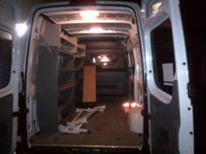 Old Steel Shelving Being Ripped Out Of Cargo Van Interior 2